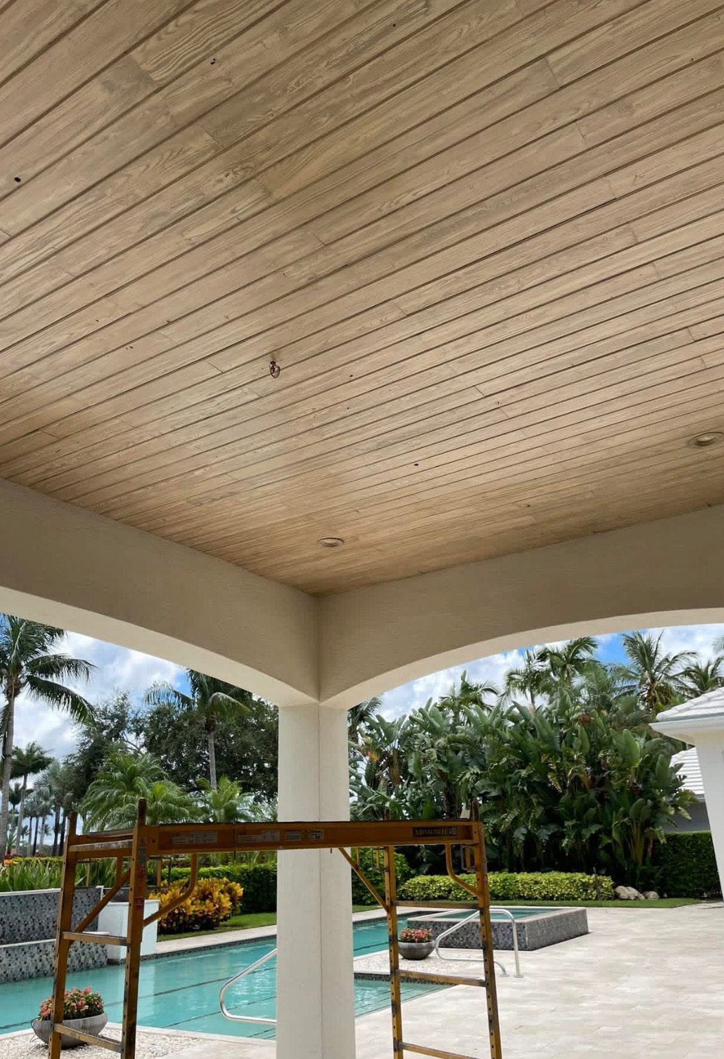 Scaffold staged for a covered patio ceiling job